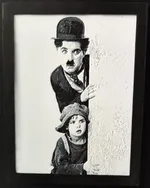 Charlie Chaplin dans le film The kid - hueforge