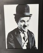 Charlie Chaplin souriant - hueforge